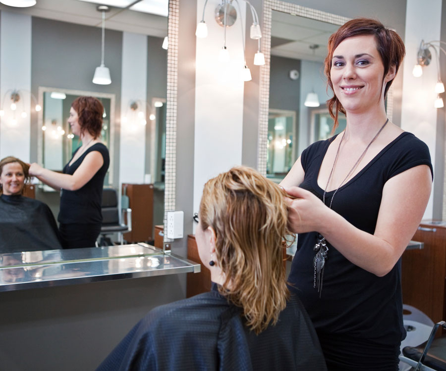 small business marketing services are geared towards small business owners like this hair salon owner